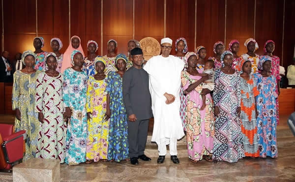 Buhari meets 21 freed Chibok girls, promises a brighter future