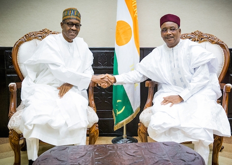 Buhari calls outgoing Niger President from UK, condemns attempted coup days to handover