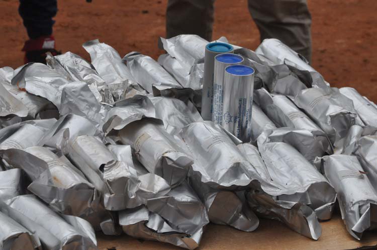 Recovered ammunition and smoke grenade canisters