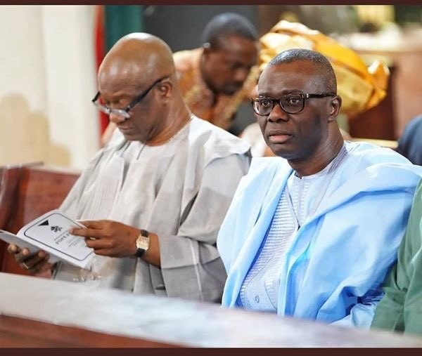 Agbaje and Sanwo-Olu seated at the Holy Cross Cathedral