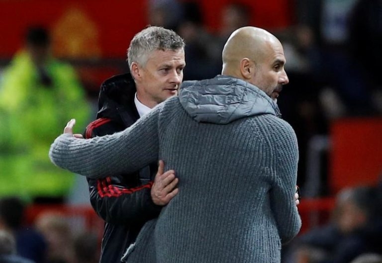 Manchester City manager Pep Guardiola and Manchester United manager Ole Gunnar Solskjaer after the match  REUTERS