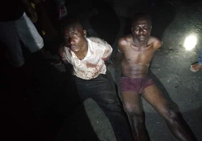 Papa Ejime and brother after allegedly killing Mr. Ukrakpo in Jeddo
