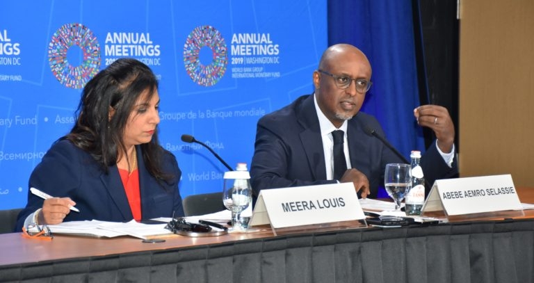 Mr Abebe Selassie, Director of the African Department at the IMF (right) with Ms Meera Louis, a Communications Officer at the Fund, during the media briefing. Photo: NAN