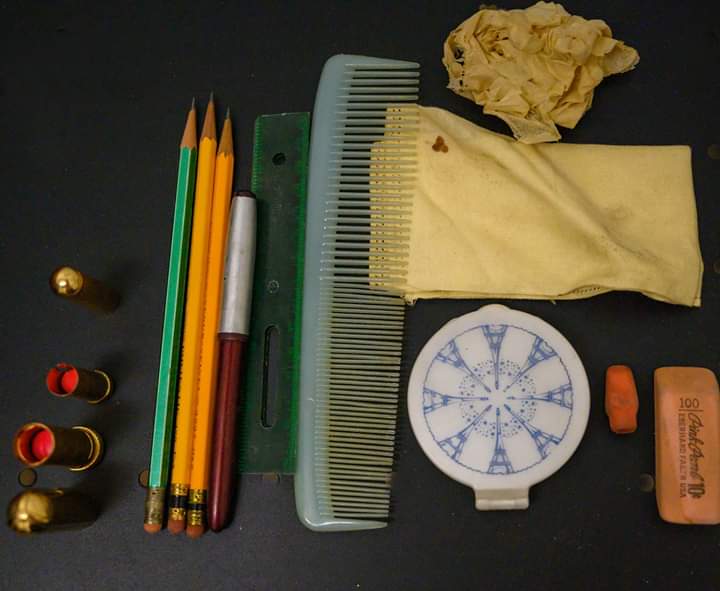A comb and other items found in Patti's purse