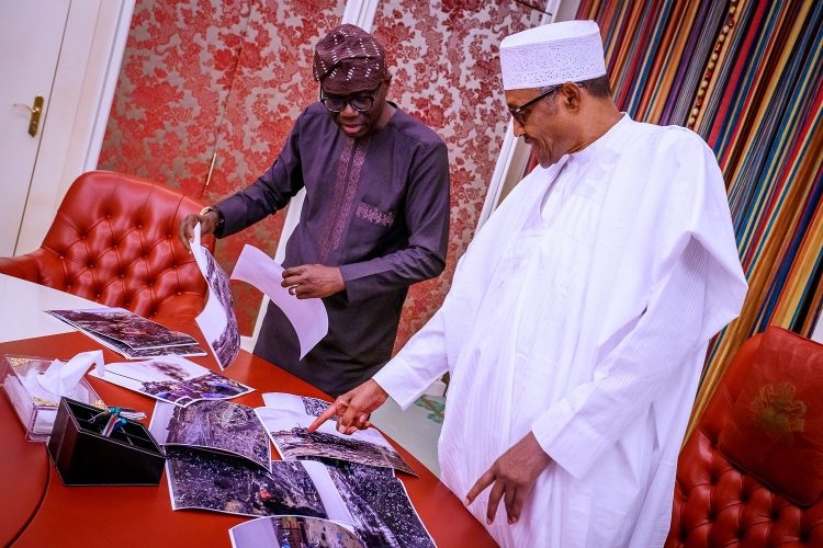 Photo News: Sanwo-Olu presents pictures from Lagos explosion site to Buhari