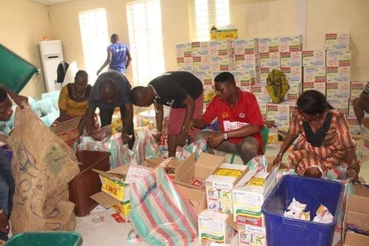 Church workers package the foodstuffs at Champions Cathedral