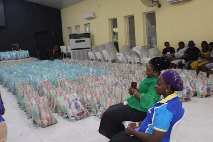 Caretakers watch over the food packs at Champions Cathedral