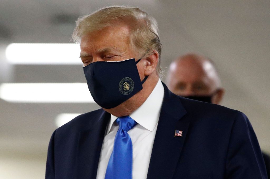 Finally, Trump wears mask in public