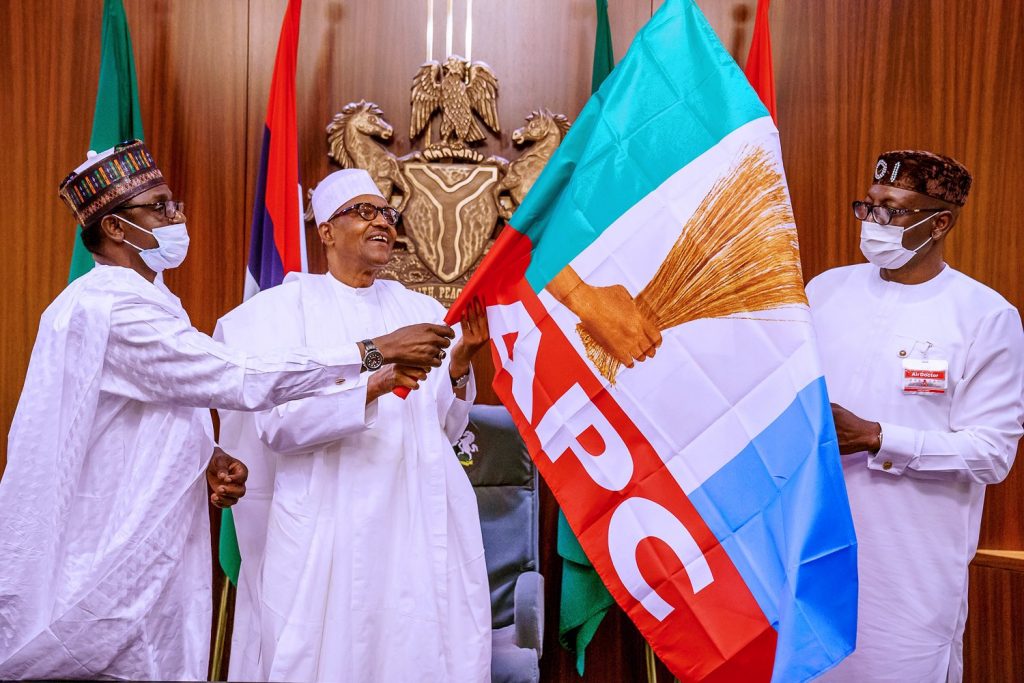 BREAKING: Buhari hands over APC flag to Ize-Iyamu [PHOTOS]