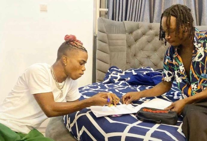 Photo: Naira Marley signs Olamide's former artiste, Lyta