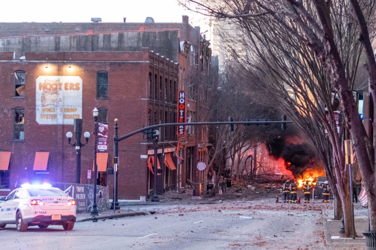 Debris litters the road near the site of an explosion in the area of Second and Commerce in Nashville, Tennessee, U.S. December 25, 2020. Elliott Anderson/Tennessean.com/USA TODAY NETWORK via REUTERS.   NO RESALES. NO ARCHIVES. MANDATORY CREDIT