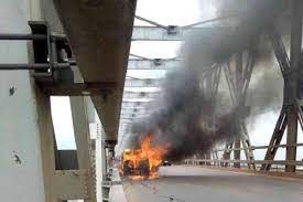 12 escape death as bus ignites on Niger bridge