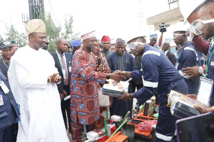 Handing over of modern plumbing tools to beneficiaries by the Executive Vice Chairman /CE of National Agency for Science Engineering Infrastructure, (NASENI) Engr Prof Mohammed Sani Haruna while Chairman House Committee on Science Research Institutions and Member representing Ibadan North Federal Constituency, Hon. Musiliu Olaide Akinremi (Jagaban)(left) and Director of Procurement NASENI, Dr. Mohammed Aminu Mohammed(left) observe during the NASENI Skill Acquisition Training and Youth Empowerment Programme today in Ibadan, South West geopolitical zone.