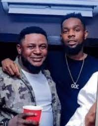 Patoranking under fire after photo with millionaire kidnapper surfaces