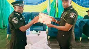President Buhari awards police officer, Amah for returning $200,000 bribe