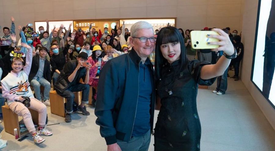 Apple’s Tim Cook is all smiles in Beijing, after TikTok chief’s grilling in Washington