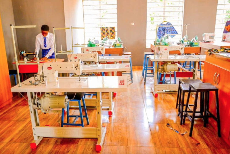 A student inside the fashion and design workshop of one of the Model Technical Colleges in Delta