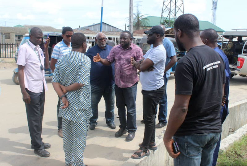 An Engineer addressing a team of journalists at one of the projects sites visited at Uti road, Effurun, Uvwie LGA, Delta State