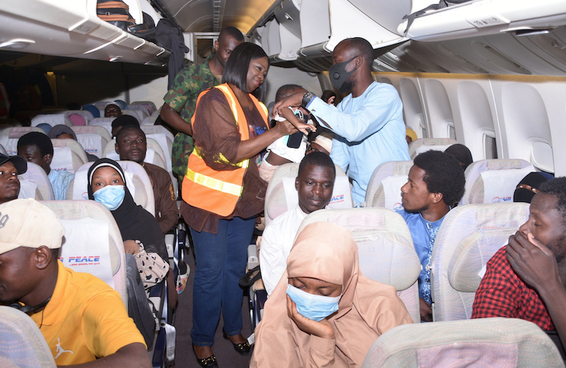 PHOTOS: First batch of 376 stranded Nigerians in Sudan arrive in Abuja