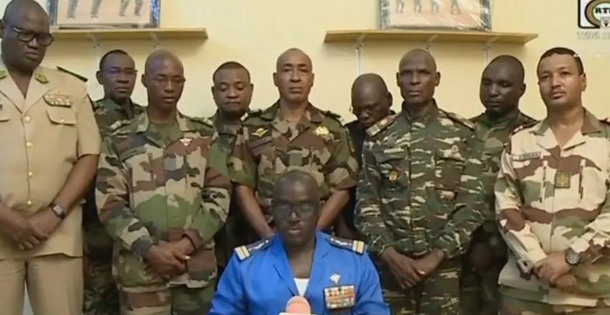 Niger Army spokesman Col. Major Amadou Adramane speaks during an appearance on national television after President Mohamed Bazoum was held in the presidential palace, in Niamey, Niger, July 26, 2023, in this still image taken from video. ORTN/via Reuters TV/Handout via REUTERS.